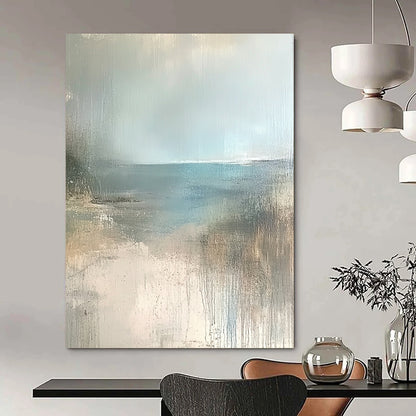 Contemporary hand-painted abstract art featuring a serene empty beach in soft beige, pale blue, and grey tones. Perfect for calming spaces. DLZ0950