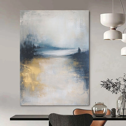 Contemporary abstract art featuring a moody ocean landscape in soft focus, neutral tones enhanced by gold and blue, creating a serene atmosphere. DLZ0464