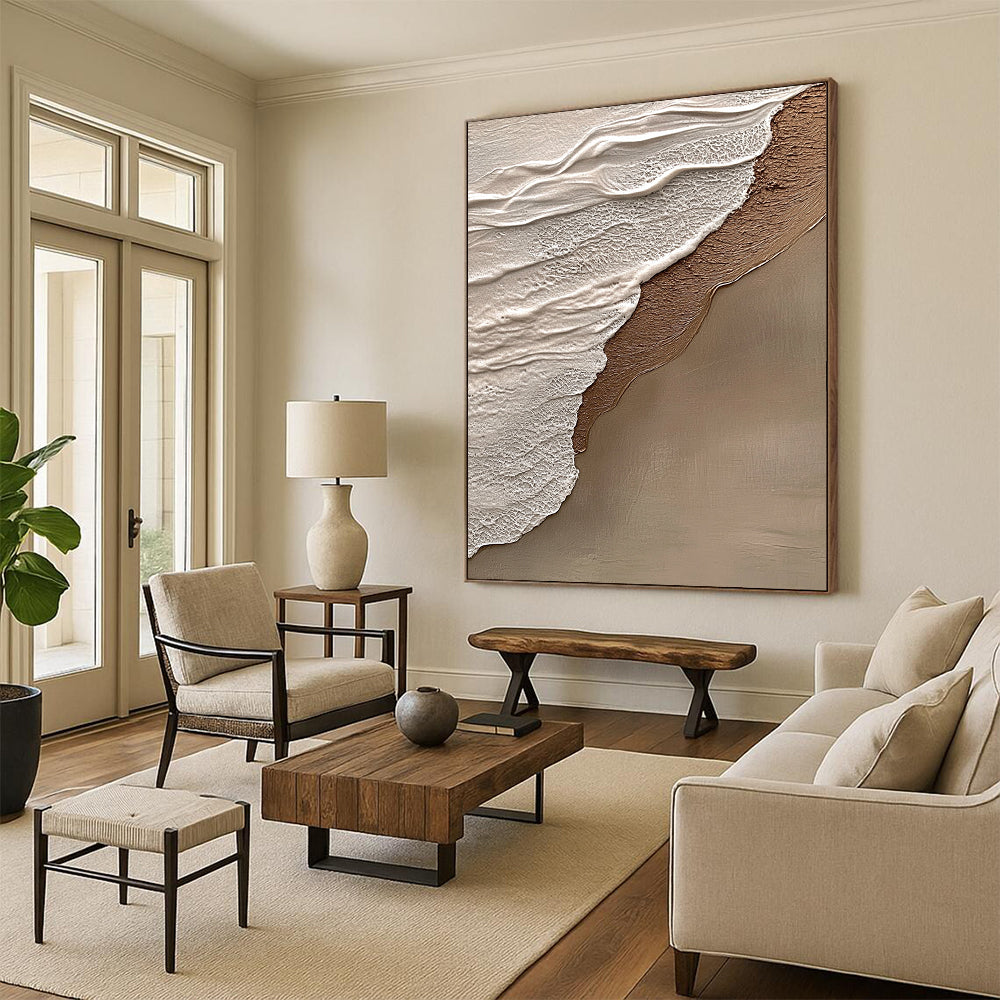 Contemporary hand-painted abstract art features beige and gray tones, evoking tranquility and harmony with a natural beach scene in the background. DLZ1212