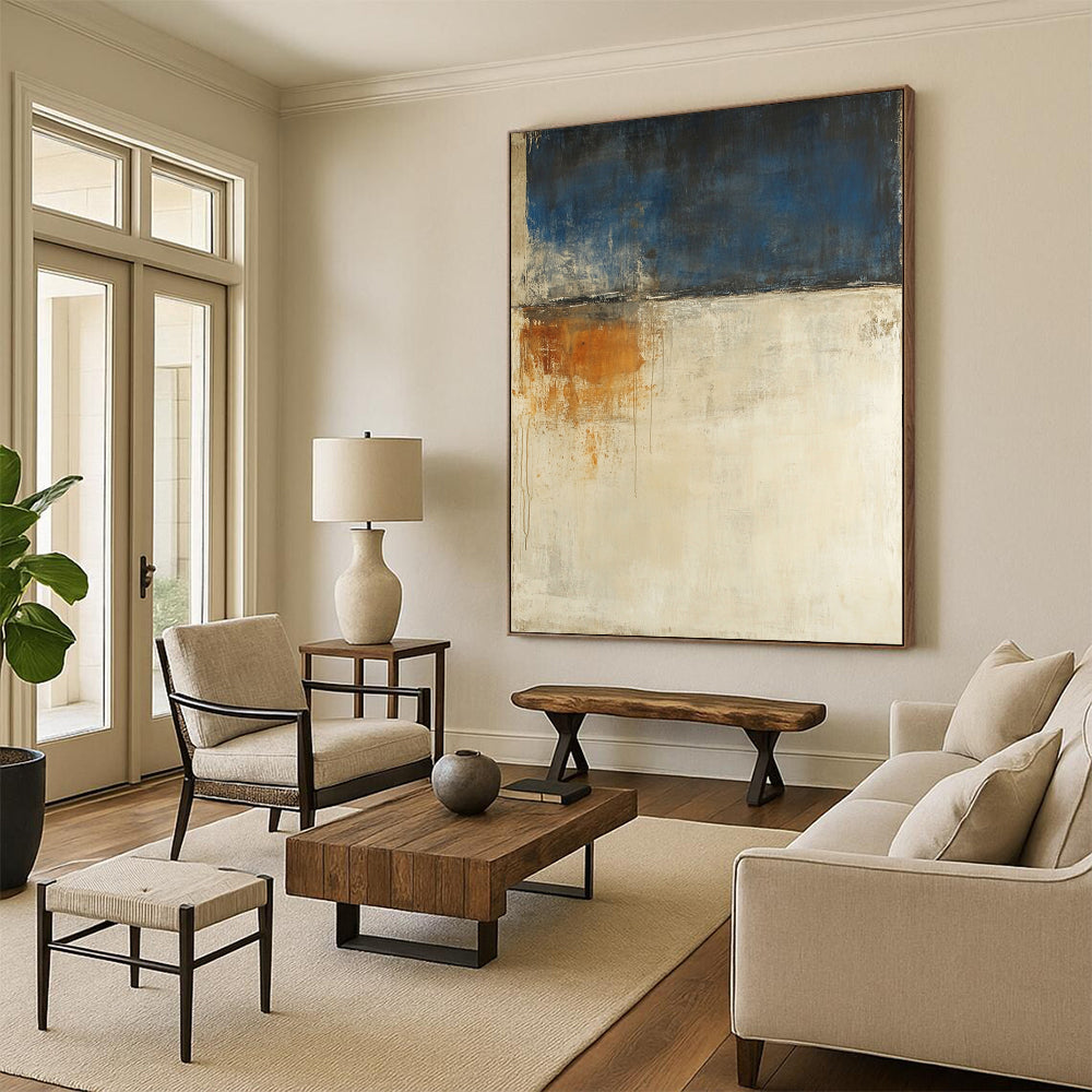 Contemporary abstract painting features a beige and blue palette large brush strokes and moody landscape with earthy tones and white spaces. DLZ0695
