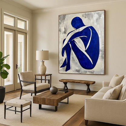 Contemporary hand-painted abstract artwork featuring a seated blue and white figure with a grey background and silver lines. DLZ0586