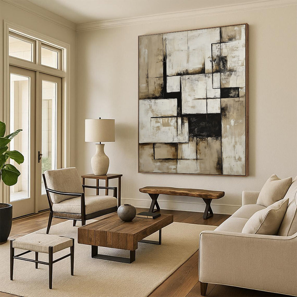 Contemporary hand-painted abstract art in neutral beige and white features geometric shapes and bold black accents for a striking visual impact. DLZ0849