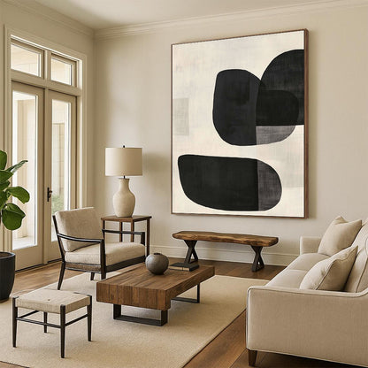 Large contemporary hand-painted abstract artwork features minimalist black and white design with curved oval shapes and textured background in soft tones. DLZ1338