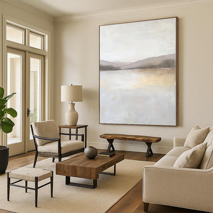 Contemporary abstract painting featuring a large lake in muted beige and gray tones with textured canvas and distant hills in the background. DLZ0415