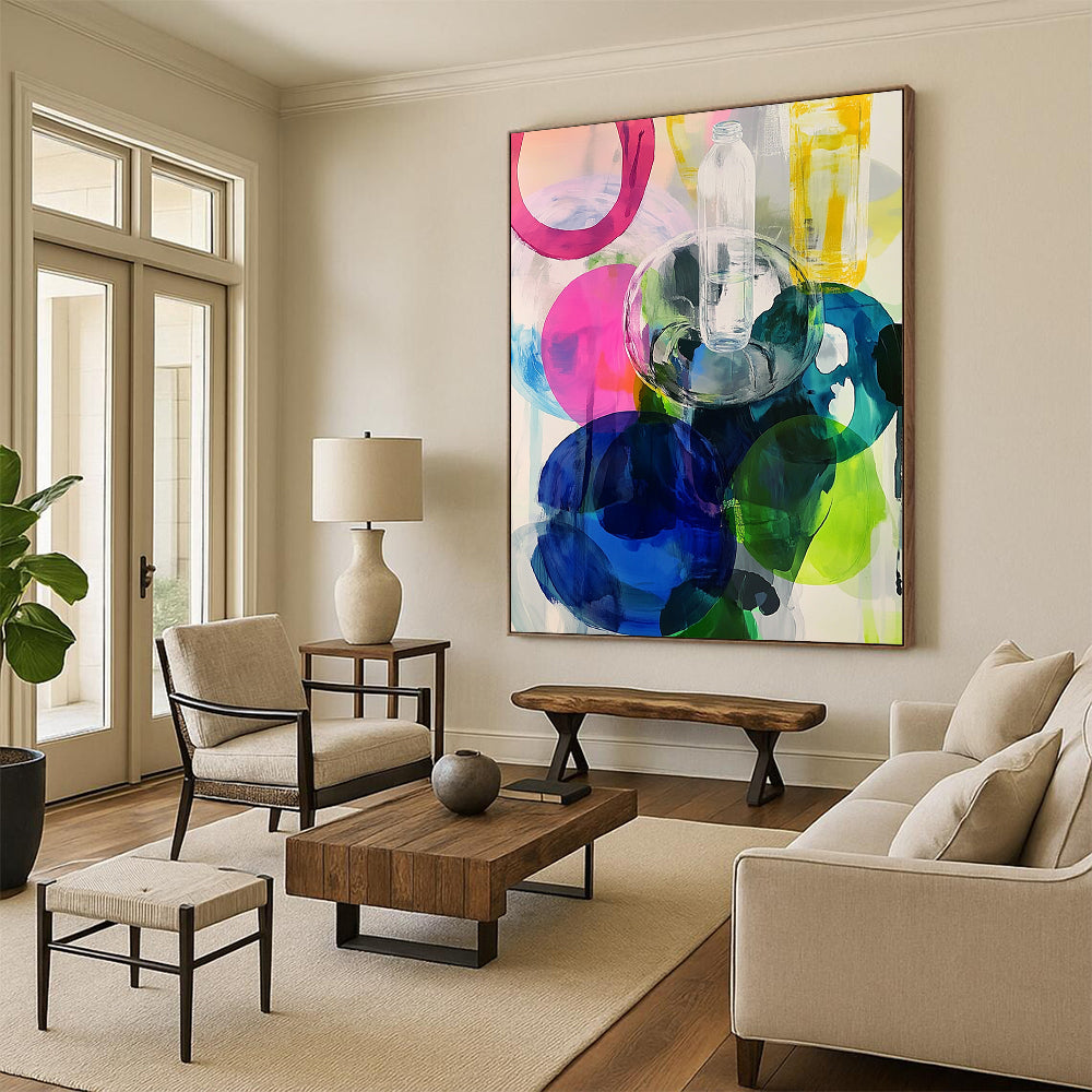 Contemporary abstract artwork featuring large round shapes in vibrant pinks blues greens and yellows enhanced with transparent plastic bottles. DLZ0984