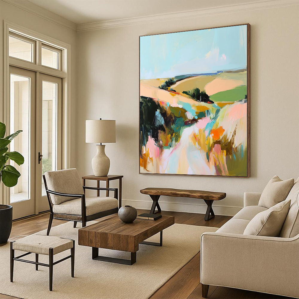 Contemporary abstract landscape painting featuring thick paint application and vibrant muted colors capturing rolling fields and hills under a serene sky. DLZ0455