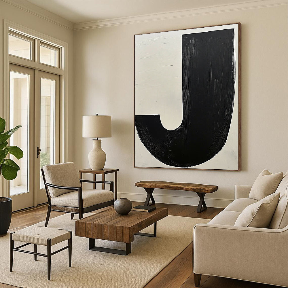 Contemporary hand-painted abstract art featuring bold black and white contrasts with a prominent beige J and a dark grey organic form. DLZ1342