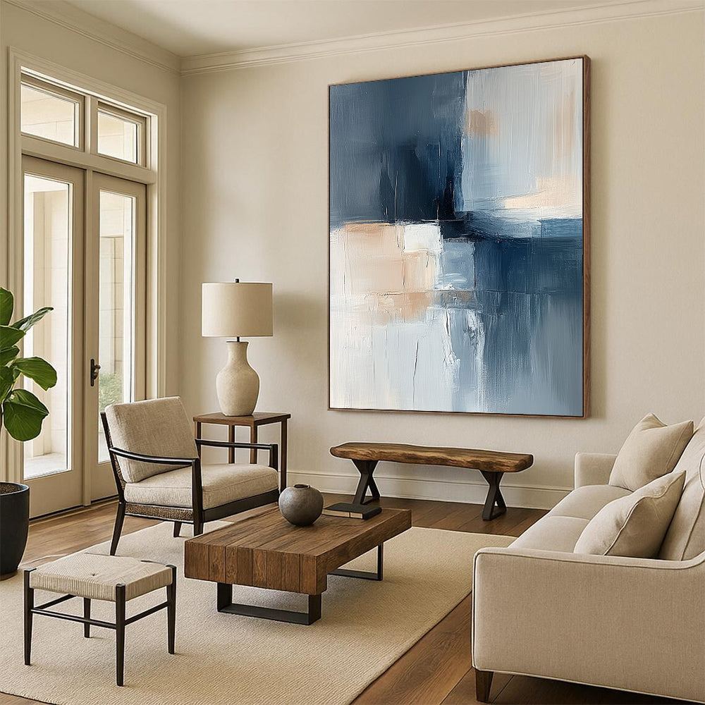 Contemporary hand-painted abstract artwork featuring soft blue gray and beige tones with layered shapes and a central dark element exuding calmness and minimalism. DLZ1052