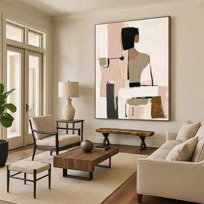 Contemporary handmade abstract art featuring muted beige black and white tones with soft pink and green hints and loose shapes around a visible table. DLZ0912