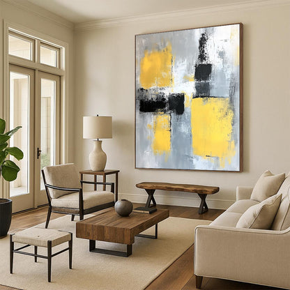 Contemporary abstract painting featuring gray and yellow color blocks with soft edges and dynamic brush strokes on a large canvas. DLZ0522