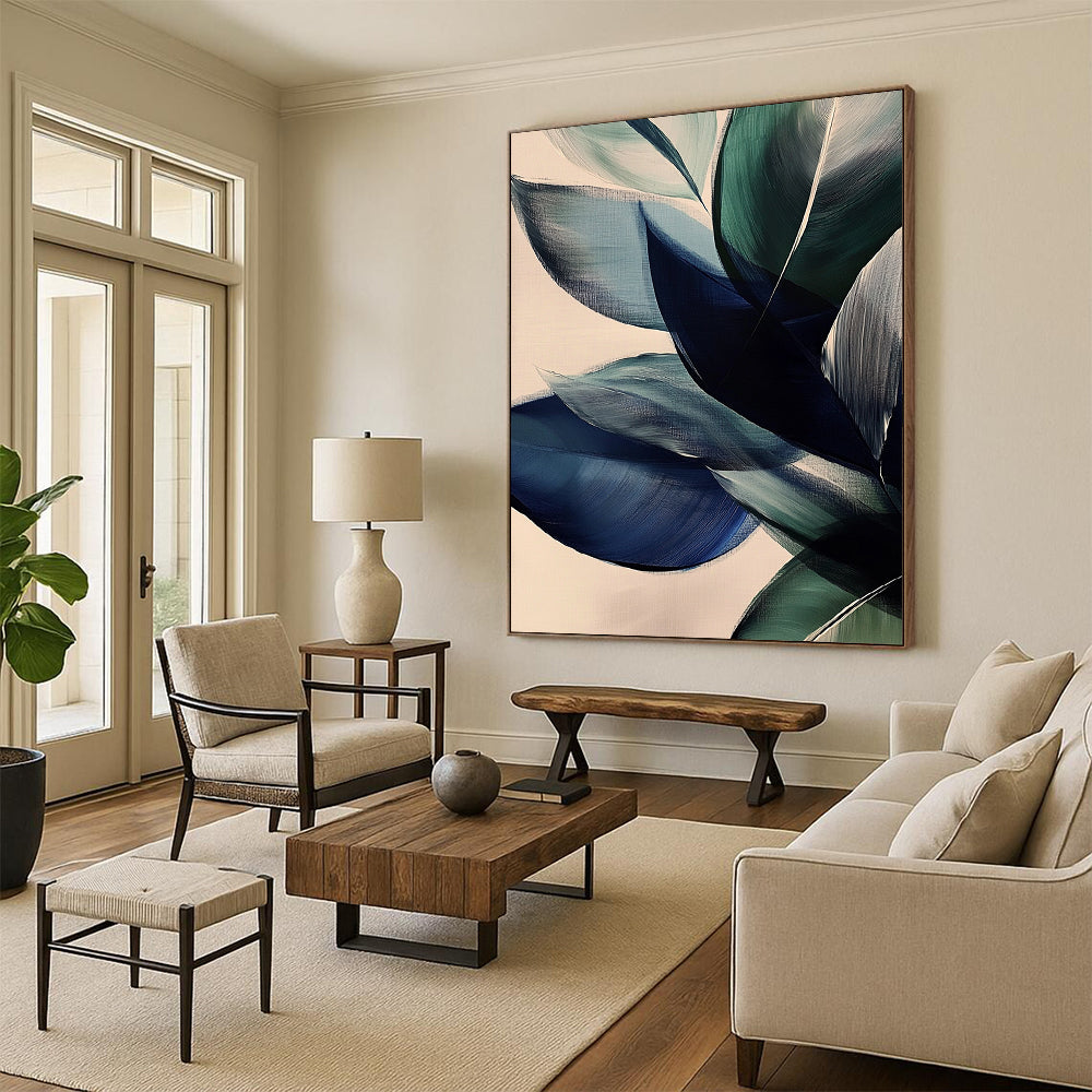 Large contemporary abstract painting featuring vibrant leaves in dark blue and green tones on a beige background with soft edges and layered forms. DLZ0625
