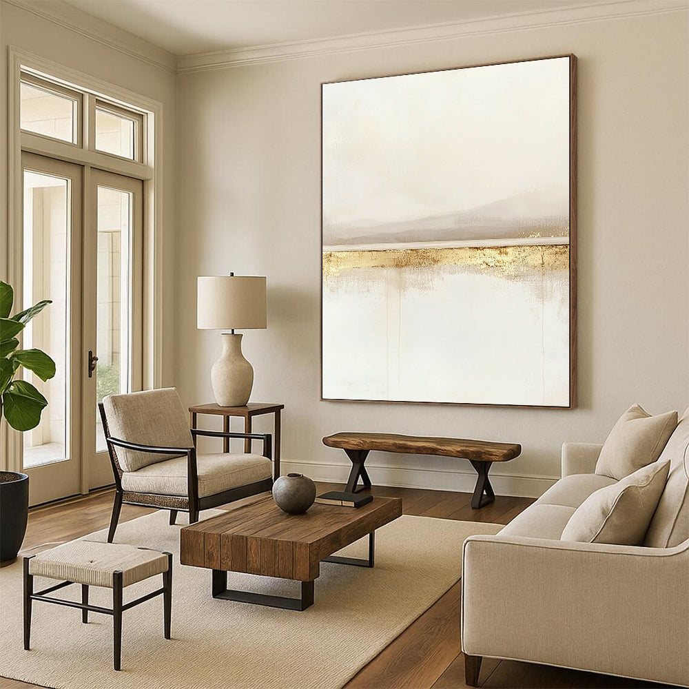 Large contemporary abstract painting featuring a serene horizon line in soft whites and beiges with subtle gold accents for a tranquil feel. DLZ1323