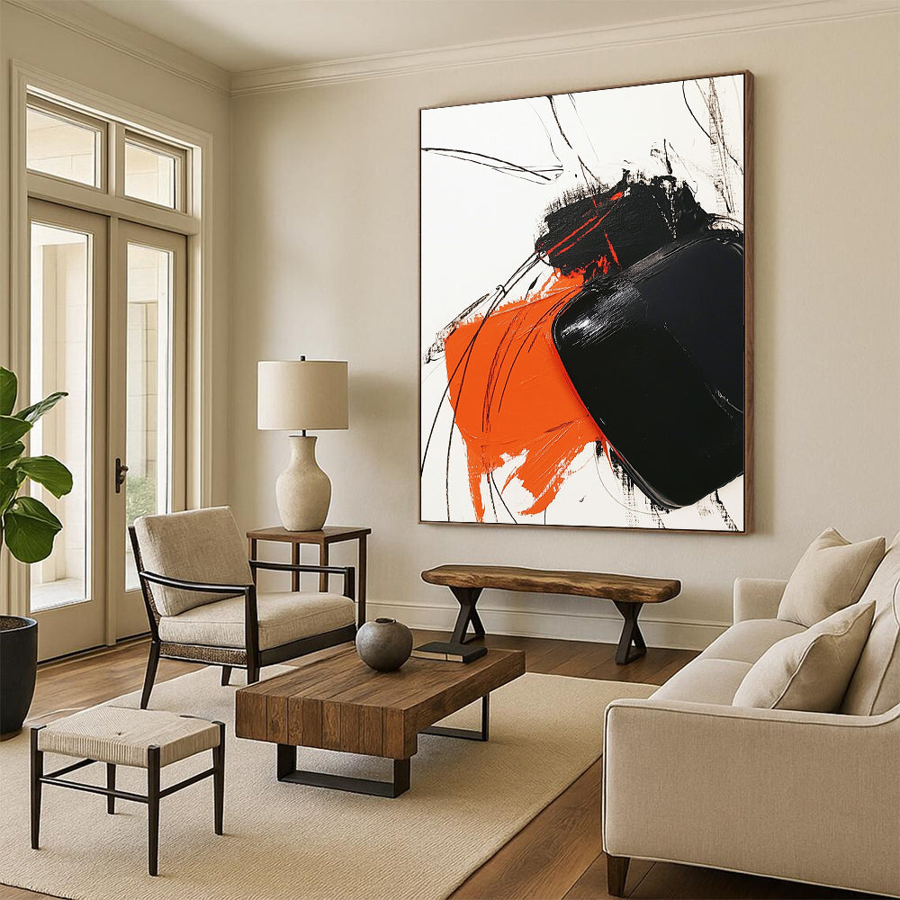 Contemporary abstract artwork features bold black and orange strokes on white, complemented by minimalistic line drawings for striking contrast. DLZ1537