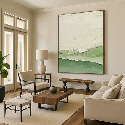 Contemporary abstract artwork featuring impasto technique with calm green and white tones and layered cream swatches evocative of serene water waves. DLZ1350