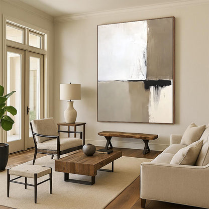 Contemporary abstract artwork featuring neutral white and beige tones accented by bold black brushstrokes simple shapes and clean lines. DLZ1604