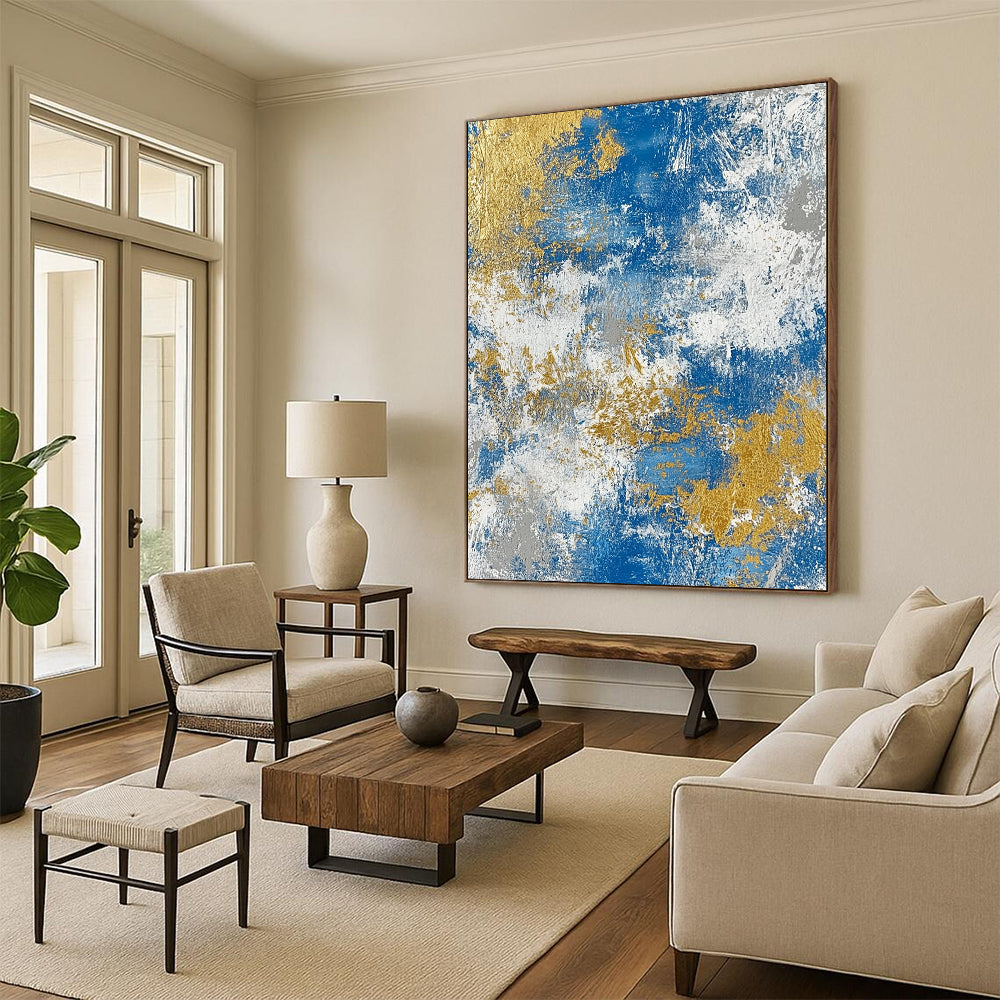 Contemporary hand-painted abstract art featuring a textured blend of blue gold white beige and silver tones for a sophisticated decor accent. DLZ0340