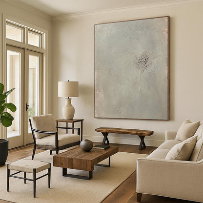 Contemporary abstract artwork featuring an empty light gray canvas with soft tones and faint embossed writing at the center. DLZ0576