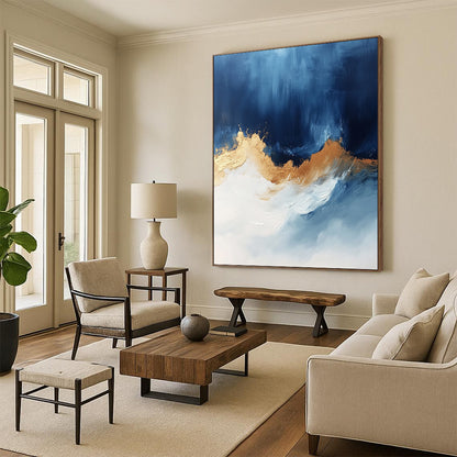 Contemporary abstract art features bold blue white and gold hues with sweeping brushstrokes energizing the canvas creating depth and visual allure. DLZ0335