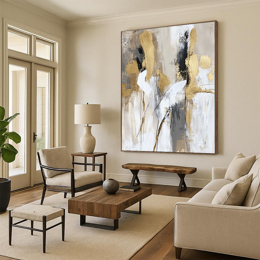 Contemporary hand-painted abstract art featuring soft brush strokes in neutral beige and white tones with elegant gold accents depicting dancing bodies in motion. DLZ0768