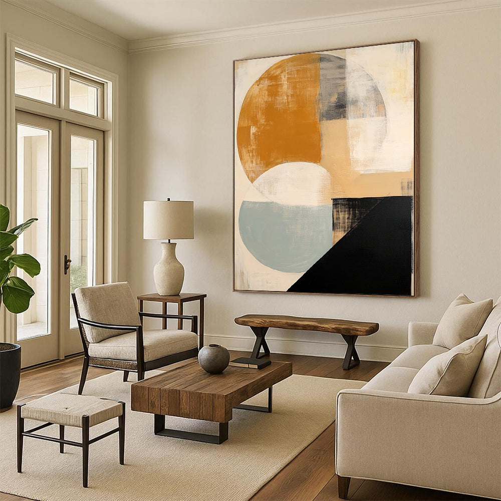Contemporary hand-painted abstract artwork featuring soft beige black and white shapes a vibrant orange circle and subtle blue and grey accents. DLZ1038