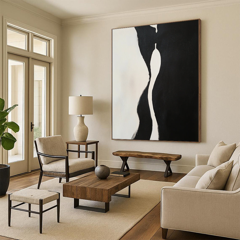 Contemporary hand-painted abstract artwork features two embracing figures with dynamic shapes and compelling negative space in a striking black and white composition. DLZ1543