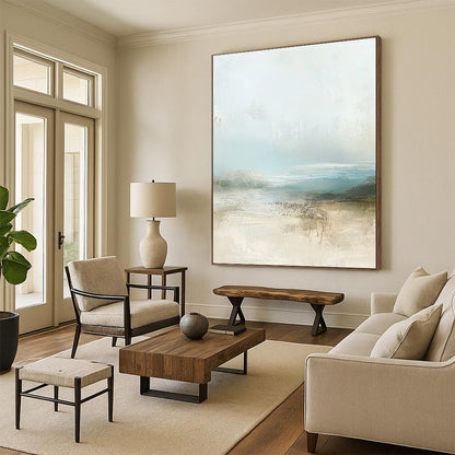 Contemporary abstract painting featuring muted pastel colors and calming beige and pale blue tones with soft atmospheric clouds. DLZ0282