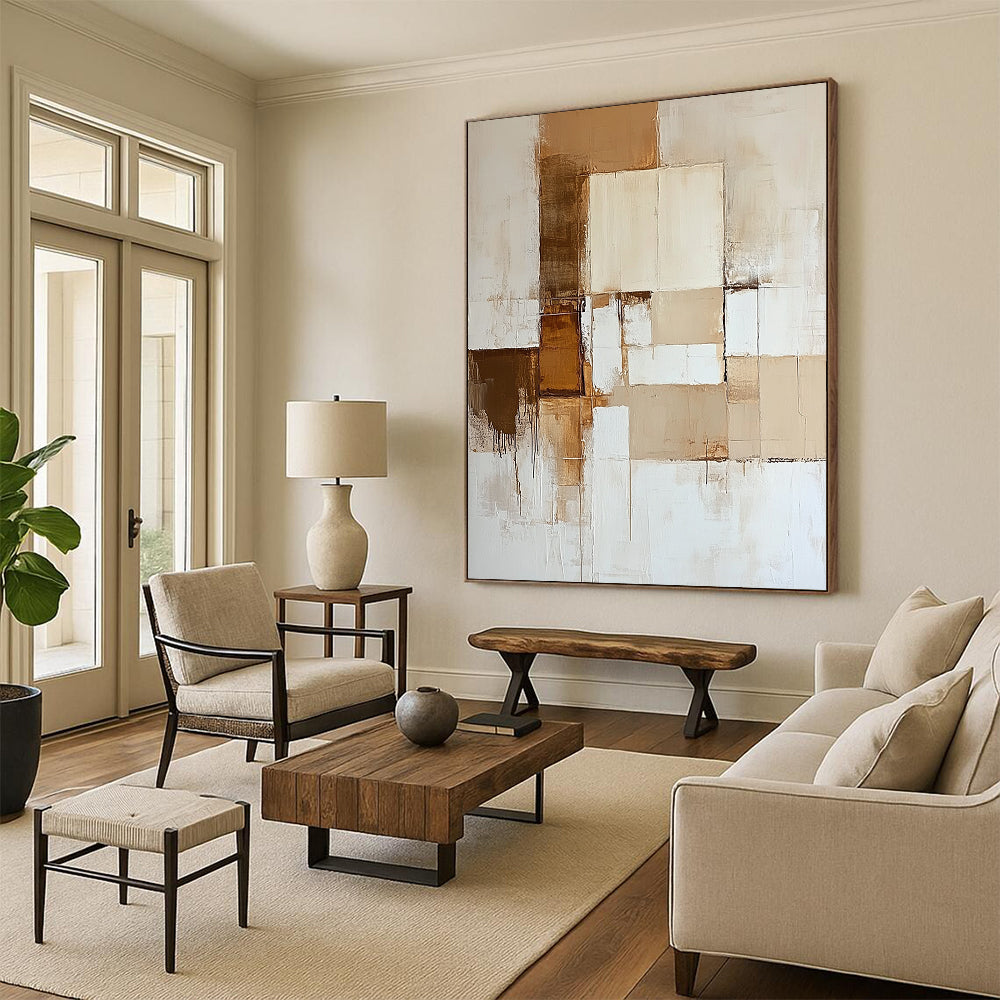 Contemporary hand-painted abstract artwork features neutral tones of beige and white with dynamic color blocks and a striking brown accent. DLZ0527