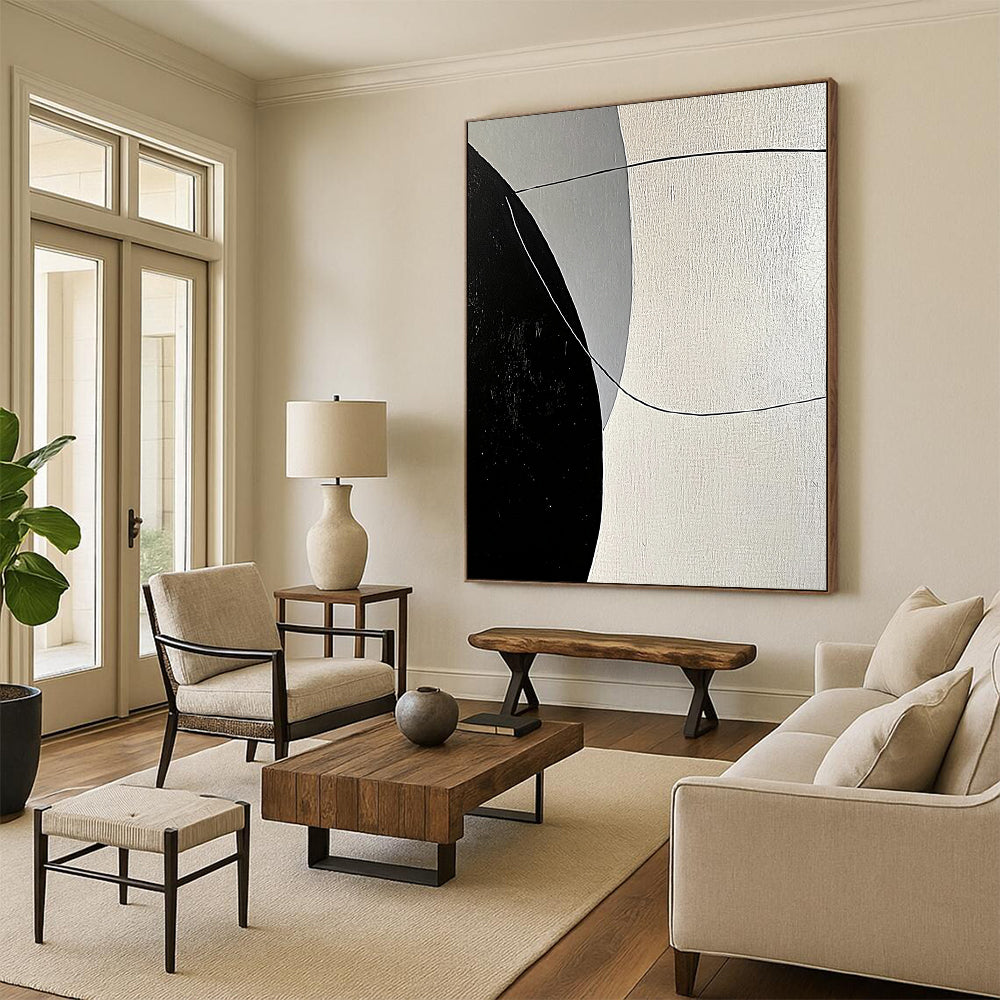 Contemporary abstract painting features bold black and white lines with smooth curves against a large gray background, showcasing minimalist geometric shapes and high contrast lighting. DLZ1654