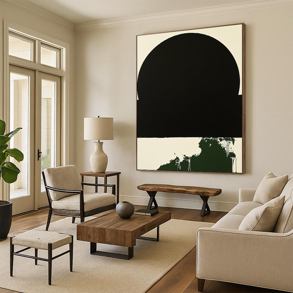 Contemporary hand-painted abstract art featuring a minimalist black circle with a white border and a small dark green splash on a black background. DLZ1382