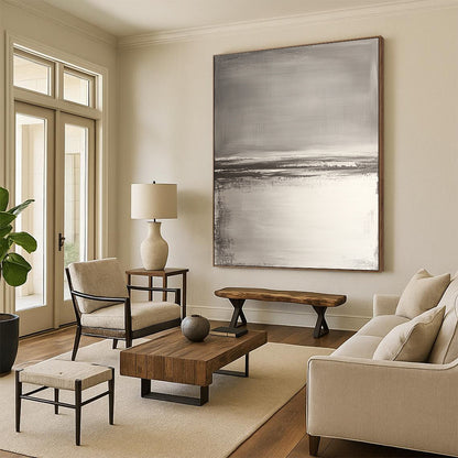 Contemporary hand-painted abstract artwork features neutral tones with gray and white, textured water reflections, and soft brush strokes for a serene beach landscape. DLZ0390