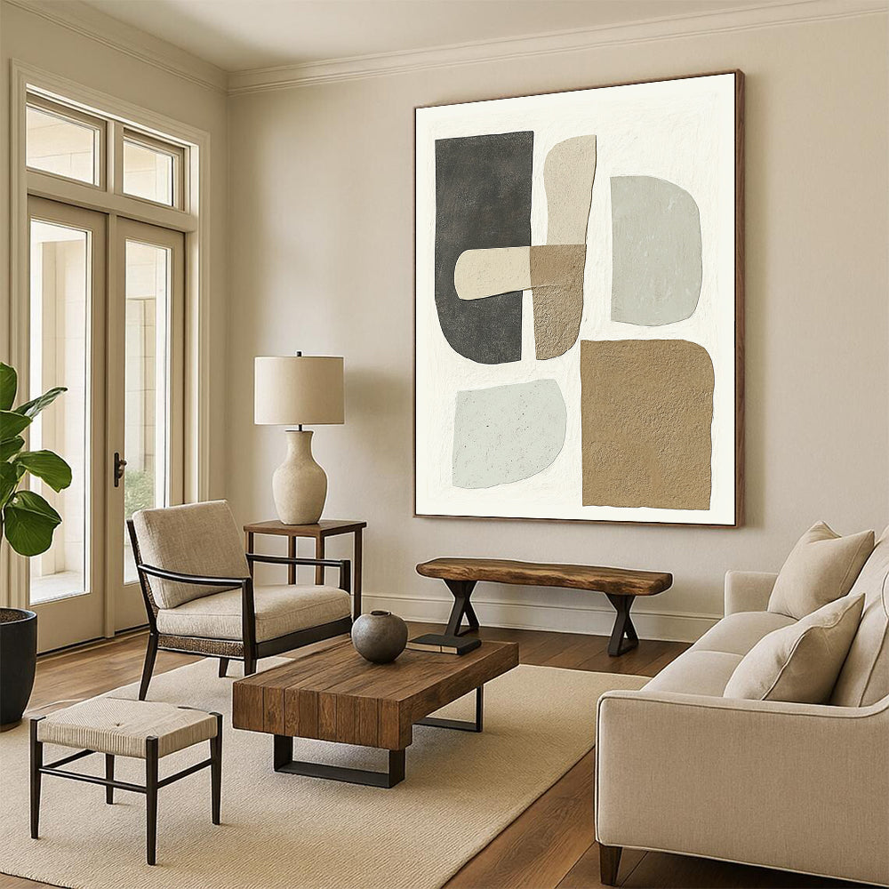 Contemporary hand-painted abstract artwork featuring minimalist shapes in soft gray beige and brown tones on a white background highlights unique textured forms. DLZ1344