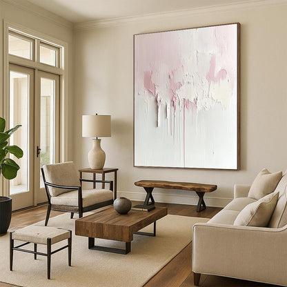Contemporary abstract painting featuring soft pink and cream hues on a textured white canvas, minimalist design with dreamy aesthetic and large negative space. DLZ0690