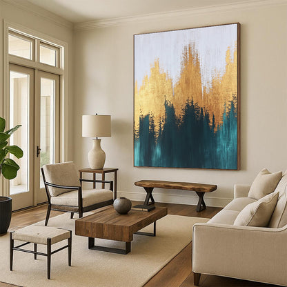 Contemporary abstract painting with textured brush strokes featuring gold and teal hues creating a serene and balanced composition on a large canvas. DLZ0388