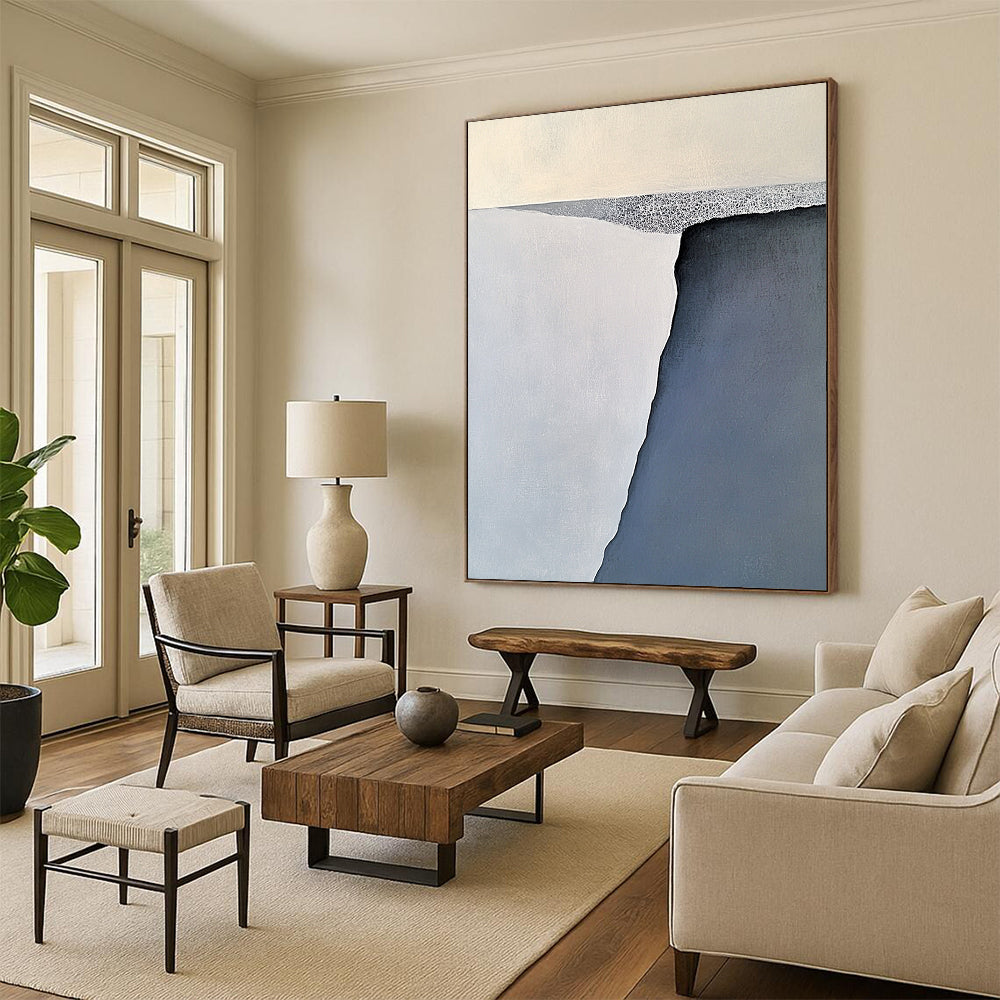 Contemporary large abstract painting features serene gray-blue and white iceberg forms with soft brushstrokes balanced on a flat gray base. DLZ1006