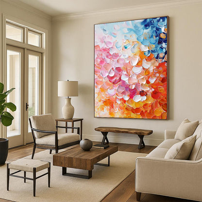 Contemporary abstract painting featuring vibrant pink, orange, and blue petals in thick impasto strokes, perfect for enhancing any modern space. DLZ0384
