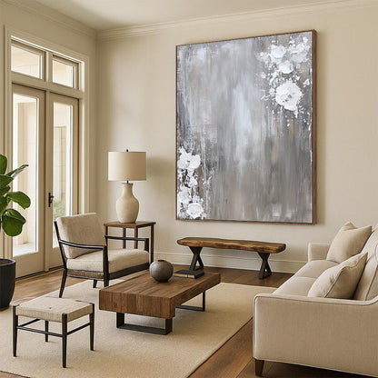 Contemporary hand-painted abstract art featuring a neutral gray and white palette with dynamic paint splashes on canvas for a minimalist aesthetic. DLZ0715