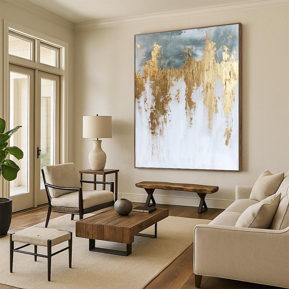 Contemporary hand-painted abstract artwork in white and gold featuring textured paint surface and elegant gold foil accents. DLZ0686