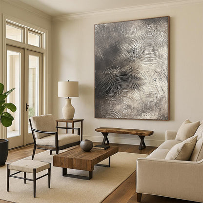 Contemporary abstract artwork features silver textures with swirling patterns on a dark gray background emphasizing depth and movement. DLZ1075