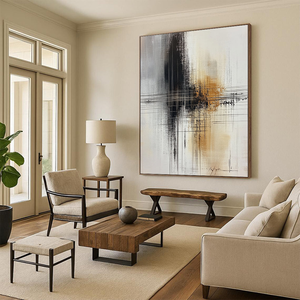 Large contemporary abstract painting featuring bold brushstrokes in black, white, and hints of gold with a central cross line drawing. DLZ0567