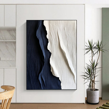 Contemporary hand-painted abstract artwork features textured white and navy blue silk, elegantly draping to create a striking visual impact on any wall. DLZ1250