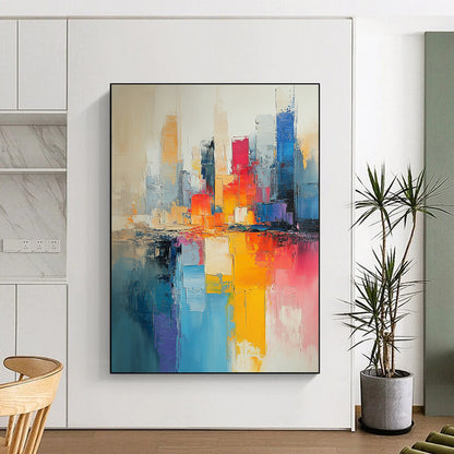 Contemporary hand-painted abstract art featuring a cityscape in muted beige and light blue tones with vibrant pinks yellows and expressive brushstrokes. DLZ0591