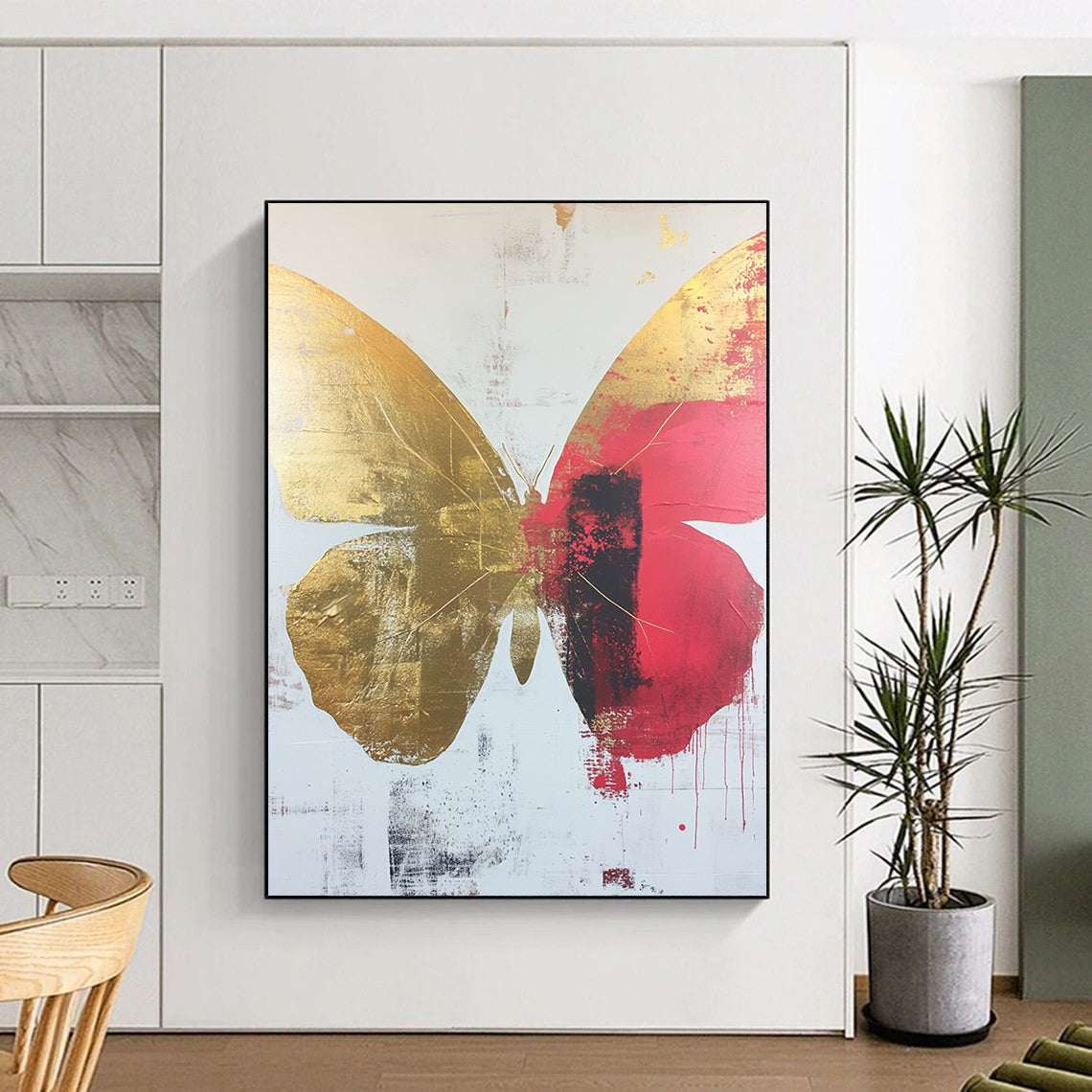 Contemporary abstract art featuring a striking butterfly design on a white background adorned with gold and red accents. Ideal for modern spaces. DLZ0369