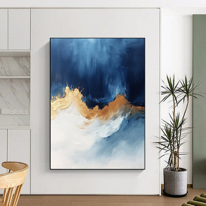 Contemporary abstract art features bold blue white and gold hues with sweeping brushstrokes energizing the canvas creating depth and visual allure. DLZ0335