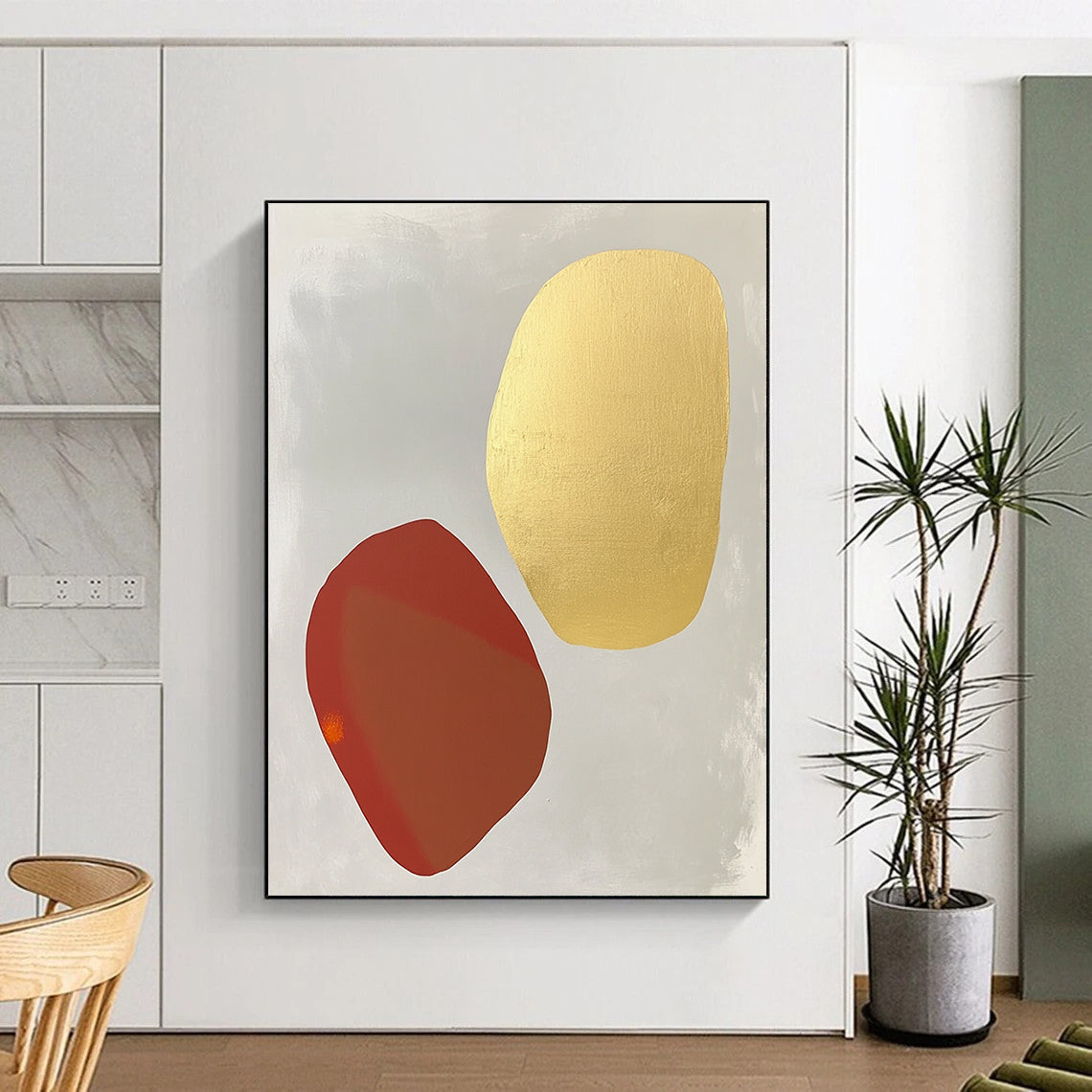 Contemporary abstract painting featuring white and gold shapes on light gray with organic forms and soft tones highlighted by pale red and orange accents. DLZ1735