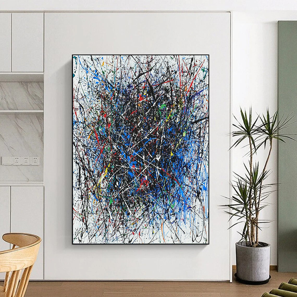 Contemporary hand-painted abstract artwork featuring vibrant interlaced lines in blue red black white green and purple with dynamic shapes enhancing its energy. DLZ1285