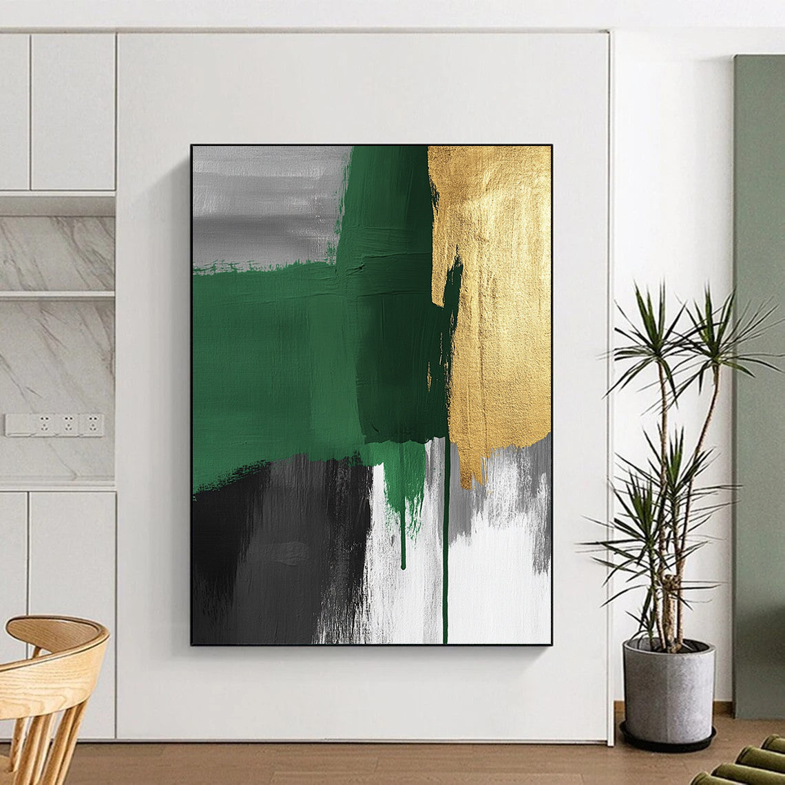 Contemporary hand-painted abstract art features green and grey brush strokes with gold accents and visible canvas texture, creating a striking surrealistic expressionist style. DLZ1626