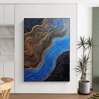 Contemporary hand-painted abstraction featuring blue and gold contrasts with gilded lines over a dark blue river in a black sand desert. DLZ1561