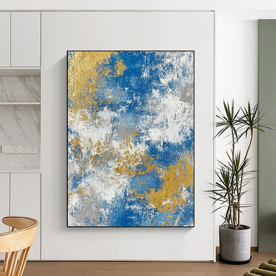 Contemporary hand-painted abstract art featuring a textured blend of blue gold white beige and silver tones for a sophisticated decor accent. DLZ0340