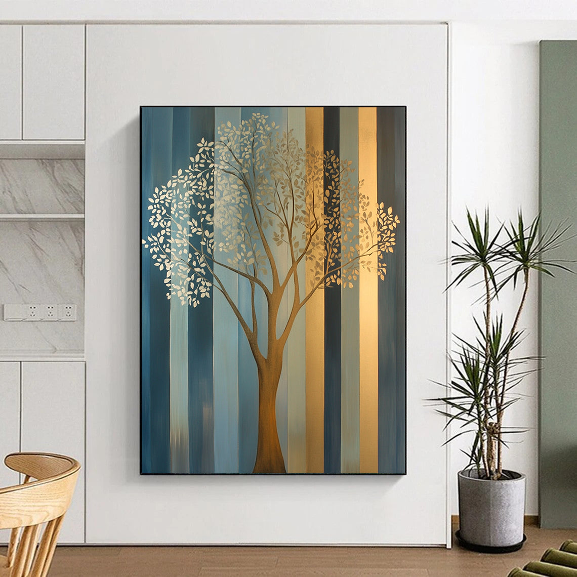Contemporary hand-painted abstract artwork features an elegant tree in soft gold and silver tones against muted teal and geometric blue-gray stripes. DLZ1403