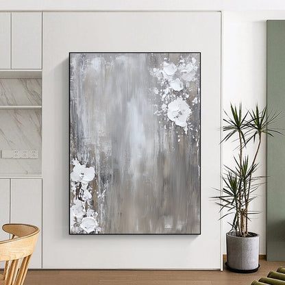 Contemporary hand-painted abstract art featuring a neutral gray and white palette with dynamic paint splashes on canvas for a minimalist aesthetic. DLZ0715